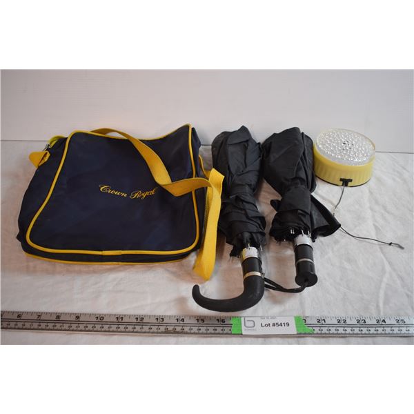 Umbrellas, Light, and Whiskey Bag