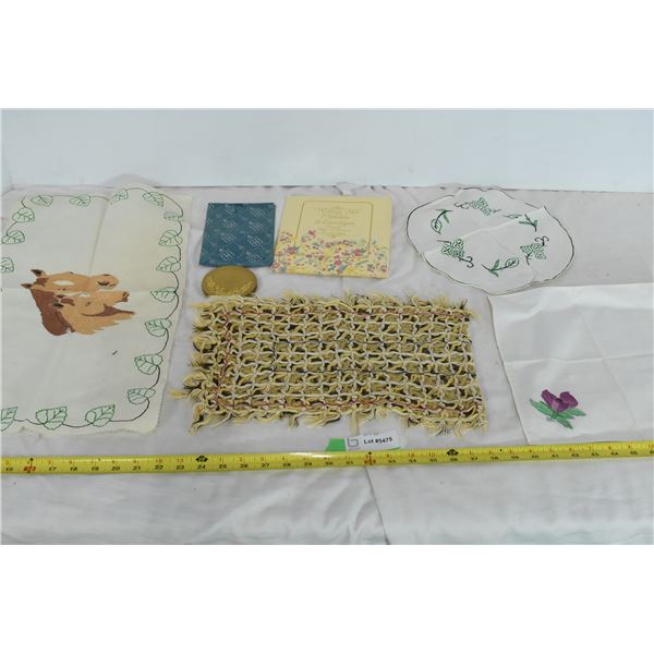 Paintings on Cloth, Gold Pocket Mirror, Knitted Item.