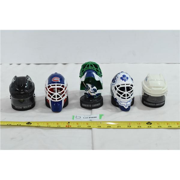 5 Small NHL Helmets w/ Figures Inside