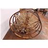 Image 3 : set of four cast iron farm implement wheels on axel 33” long 25” wheel diameter
