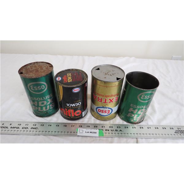 (4) empty Esso oil tins