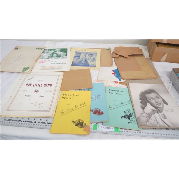 song books, stampeders specials, plus misc