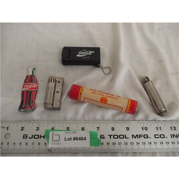 schraders tire guague, lighter, flashlight, shell dry stick lubricant tin