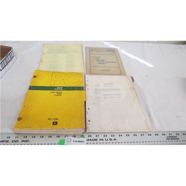 J.D Parts catalog, manuals + farm account book