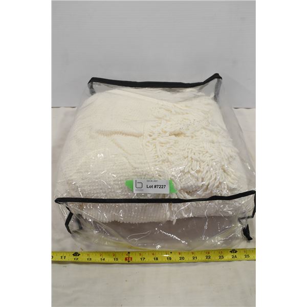 White Throw Blanket in Package