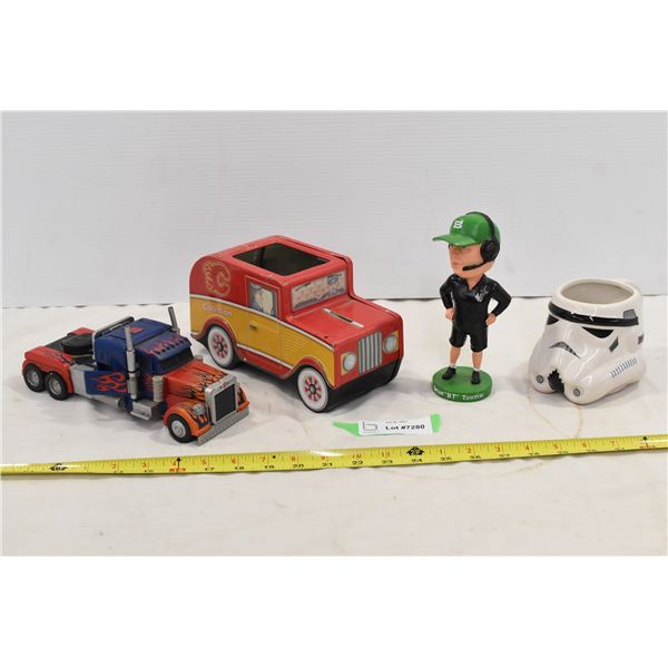 Misc. Lot of Tin Piggy Bank, UofS Coach, Transformer, Storm Trooper Mug