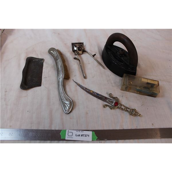 vintage razor, brush, ornamental dagger, sad iron, clippers