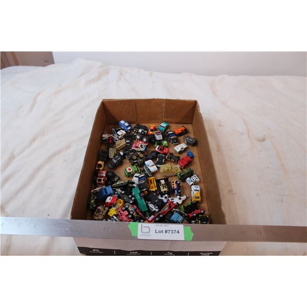 Box of miniature plastic cars