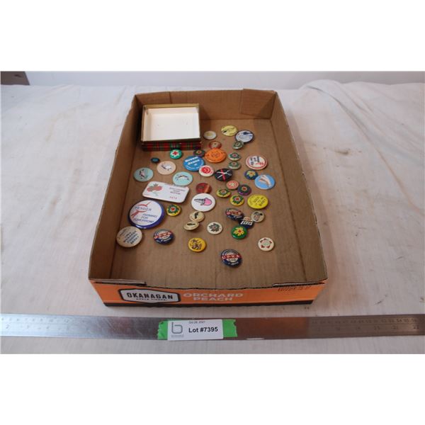 Box of button/pins, red cross, misc