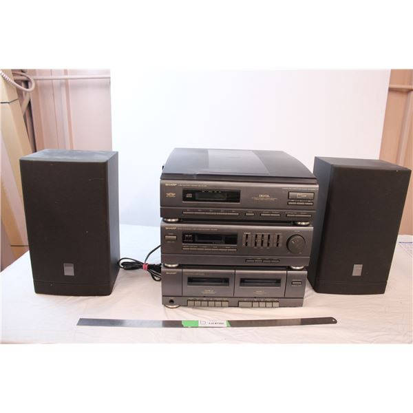 *Sharp stereo; cd’s, cassettes, and radio with speakers and manual