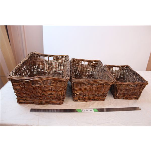 Set of three wicker baskets