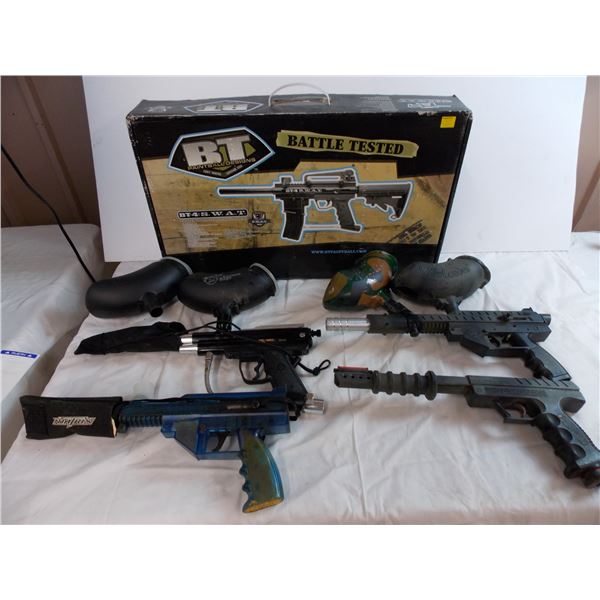 Paintball Guns in case + various paintball guns