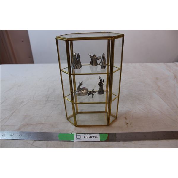 Glass display case with magical figures