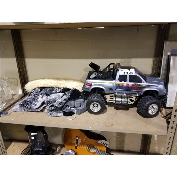 R/C TRUCK WITH REMOTE, BLANKETS, ETC