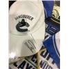 Image 2 : SHADOW BOX OF VANCOUVER CANUCKS SIGNED APPAREL AND TICKETS