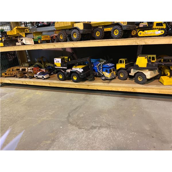 SHELF LOT OF ASSORTED TONKA TRUCKS, AND MORE