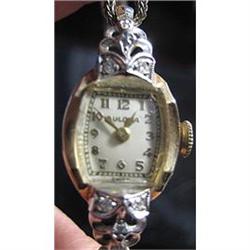 14kt yellow gold and diamond ladies watch #2171091