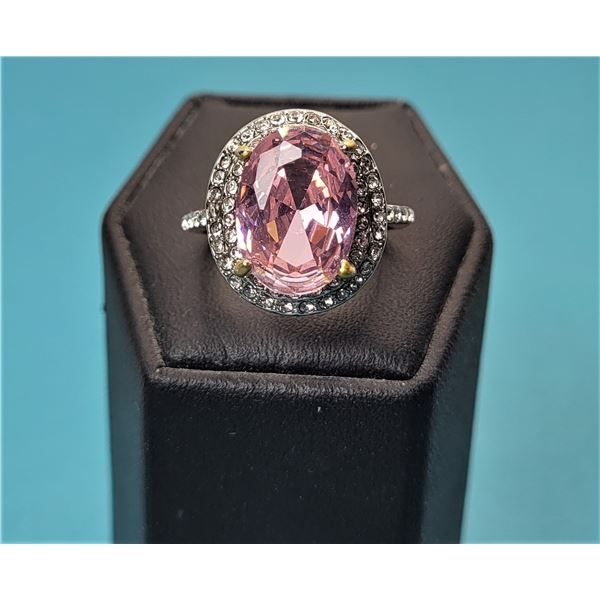 15)  LAB CREATED PINK OVAL SAPPHIRE HALO