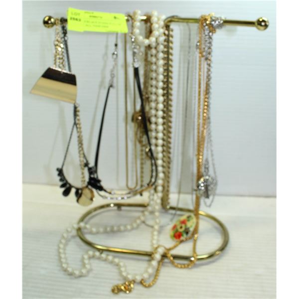 BRASS NECKLACE STAND FULL OF JEWELRY ALL TOGETHER