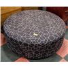 ROUND OTTOMAN ON WHEELS - BLACK AND WHITE