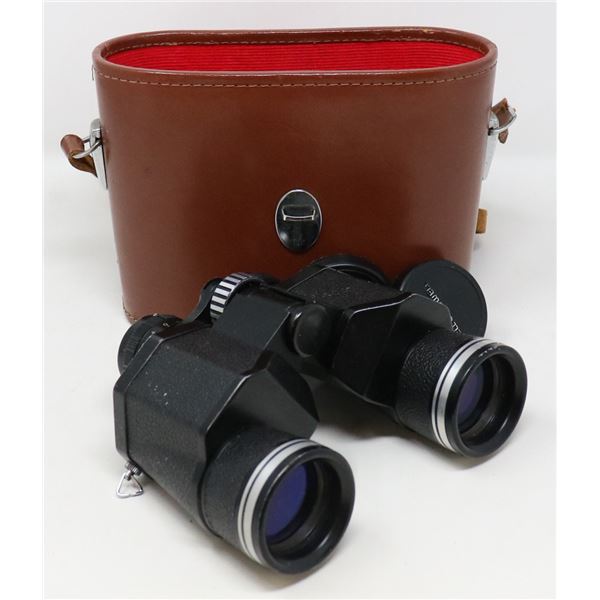 BELL AND HOWELL BINOCULARS IN BROWN LEATHER CASE