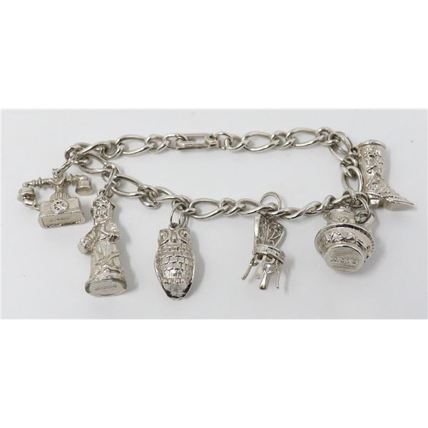 SILVER TONE AVON CHARM BRACELET