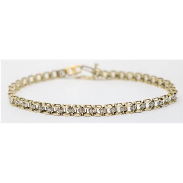 10K YELLOW GOLD TENNIS BRACELET WITH CLEAR STONES