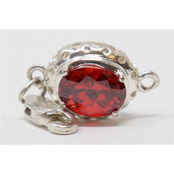 STERLING SILVER CHARM WITH ORANGE STONE
