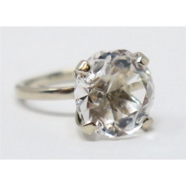 SILVER TONE RING WITH CLEAR STONE