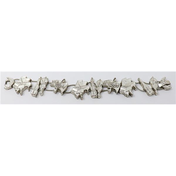 SILVER TONE BRACELET WITH MUSIC FIGURES