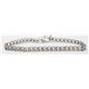 Image 1 : 10K WHITE GOLD TENNIS BRACELET WITH CLEAR STONES