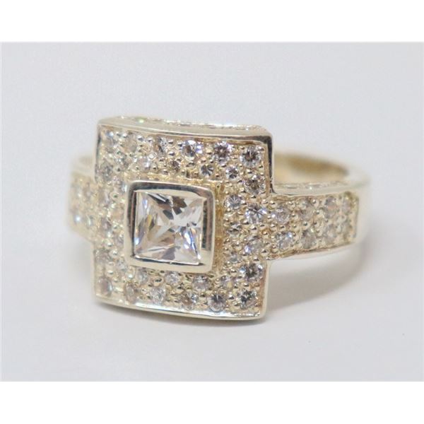 SILVER RING WITH CLEAR STONES