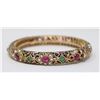 Image 1 : 7K GOLD BANGLE WITH NATURAL RUBIES,