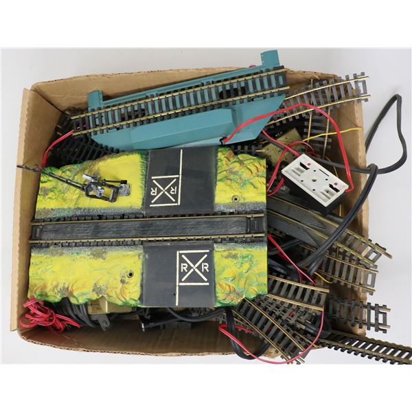 BOX FULL OF HO SCALE TRACK W TRANSFORMERS