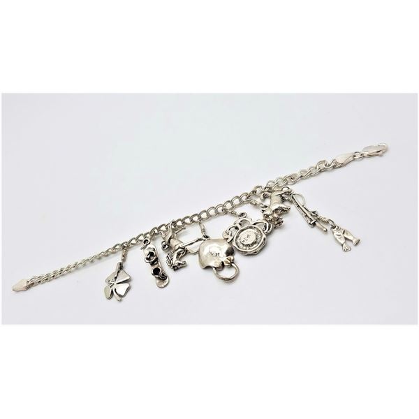 ESTATE 925 SILVER 7" 7 CHARMS 24.4GRAMS BRACELET