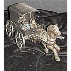 Amish buggy w/ horse, driver and passengers #2162096