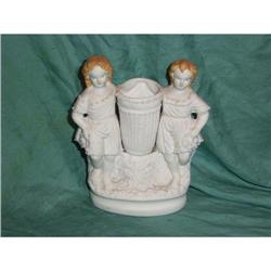 Antique bisque porcelain vase hold by 2 childre#2169040