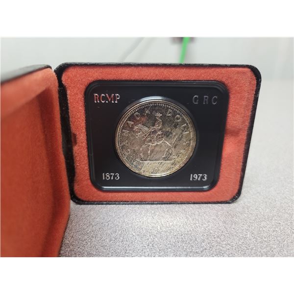 1973 RCMP Centennial Silver  Dollar   (Toned )