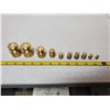 Image 1 : 10 brass weights for scale