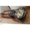 Image 1 : cowboy guitar 24 1/2" scale approx with custom made hard wood case, well played guitar