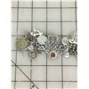 Image 2 : VINTAGE CHARM BRACELET MANY STERLING SILVER CHARMS