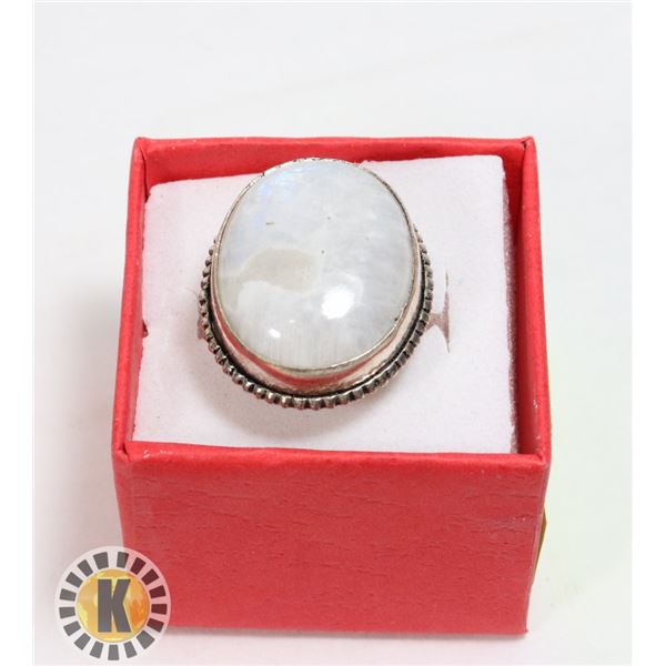 8)  NATURAL LARGE OVAL MOONSTONE RING SET IN