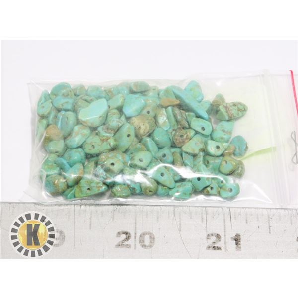 7)  LOT OF 28 CGRAMS OF DRILLED HOWELITE FOR