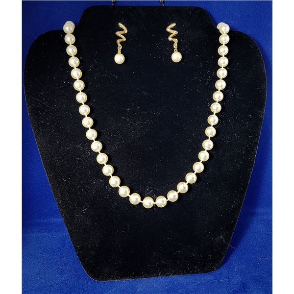 15)  SINGLE STRAND OF 24  FAUX PEARLS AND