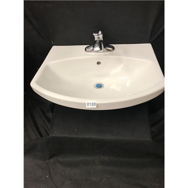 White Pedestal Sink and Faucet Set