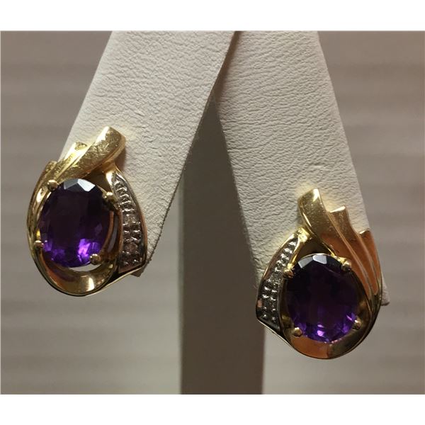 14k ladies 9 x7 Oval Amethyst and .04 ct Diamond Earrings 3.5 Dwt
