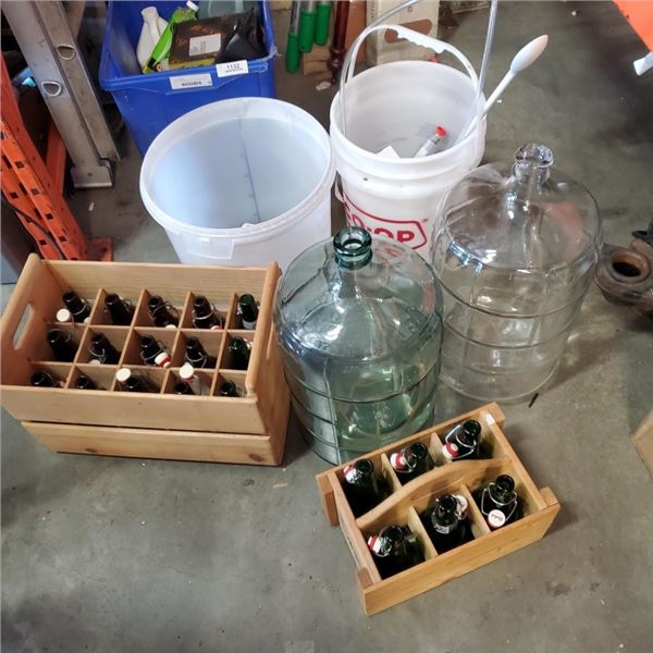 LOT OF WINE MAKING CARBOYS AND BUCKETS WITH 2 WOOD CRATES OF BOTTLES BOTTLES