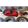 Image 2 : 4 GAS POWERED GO KART WHEELS AND 2 RC CARS NO REMOTES