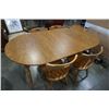 Image 1 : WOOD DINING TABLE WITH 2 LEAFS AND 4 CHAIRS