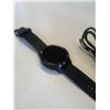 Image 2 : Garmin vivo active 3 smartwatch working with charger